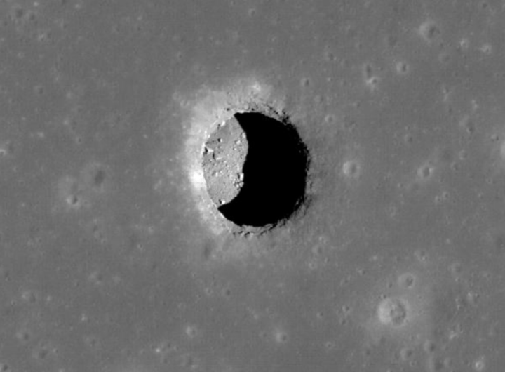 A pit, leading to a cave, in the Mare Tranquillitatis region of the moon.